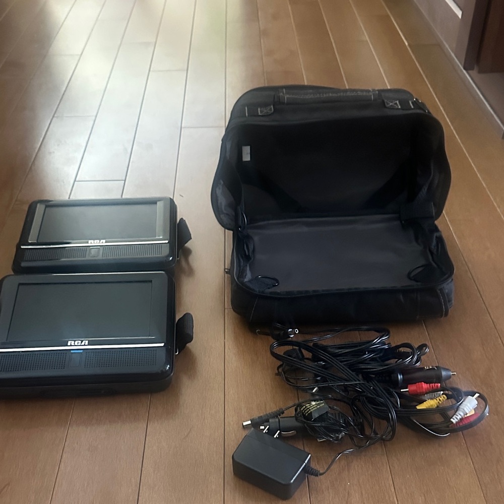 RCA Portable DVD Player Set with Accessories! Includes 18 DVDs-see last picture!